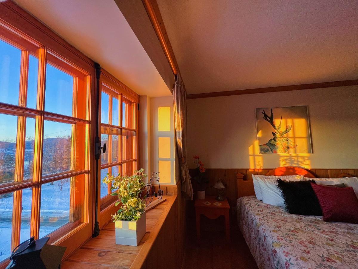 Auberge Au Poste De Traite Sainte-Famille Екстериор снимка